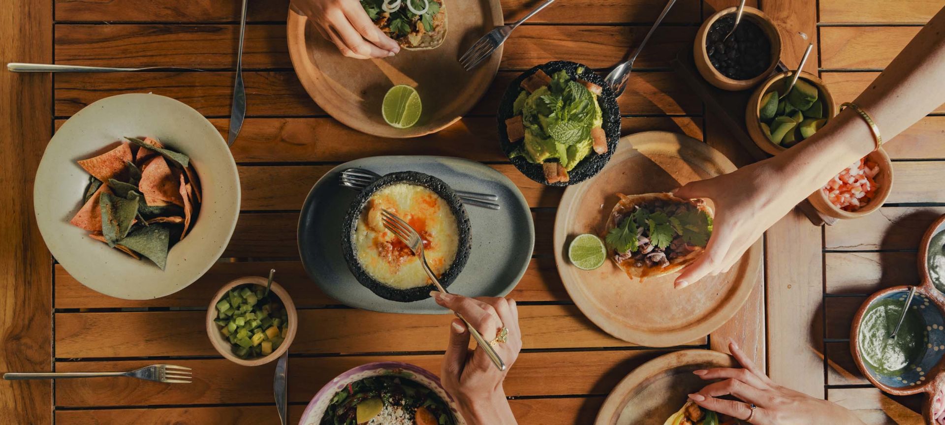 A Group Of People Preparing Food