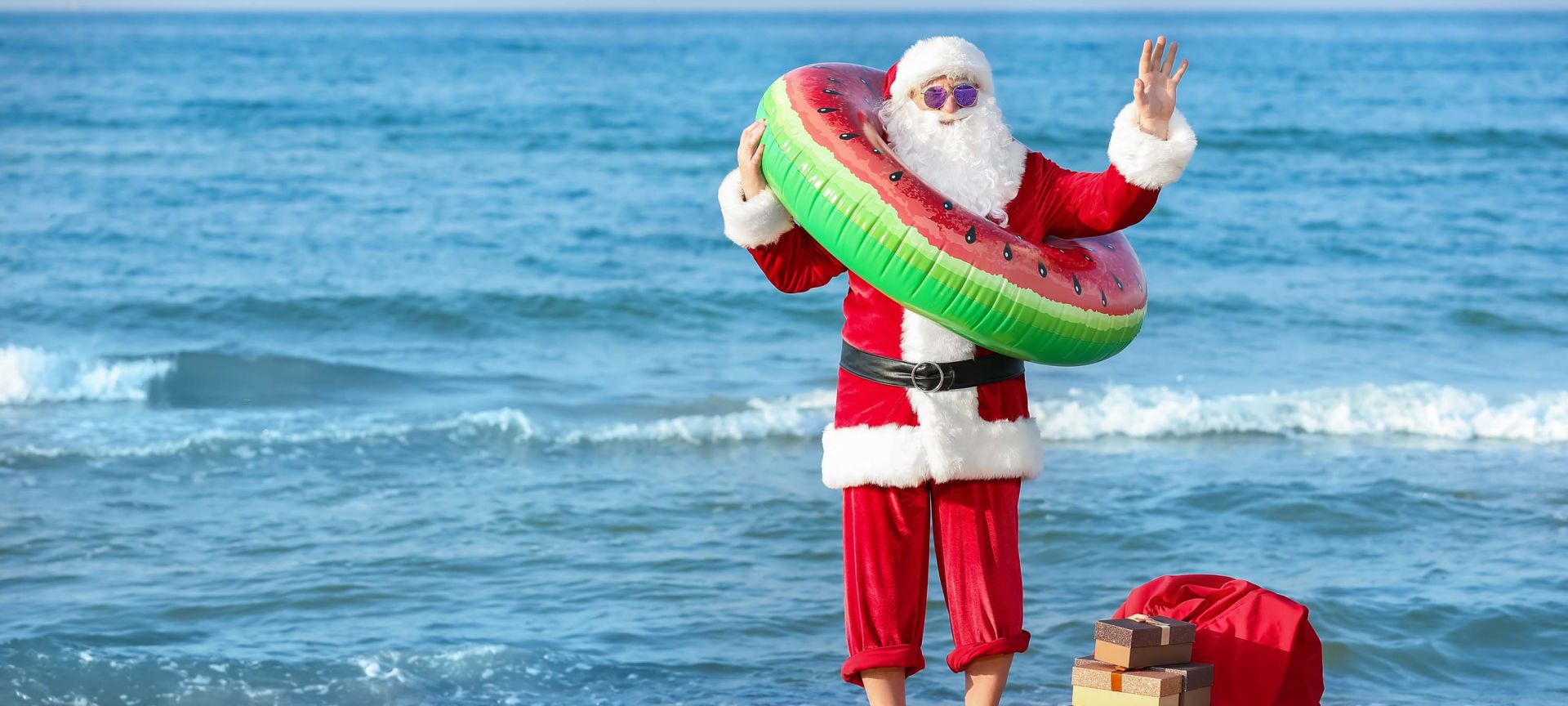 Santa Claus Barefoot on the Beach